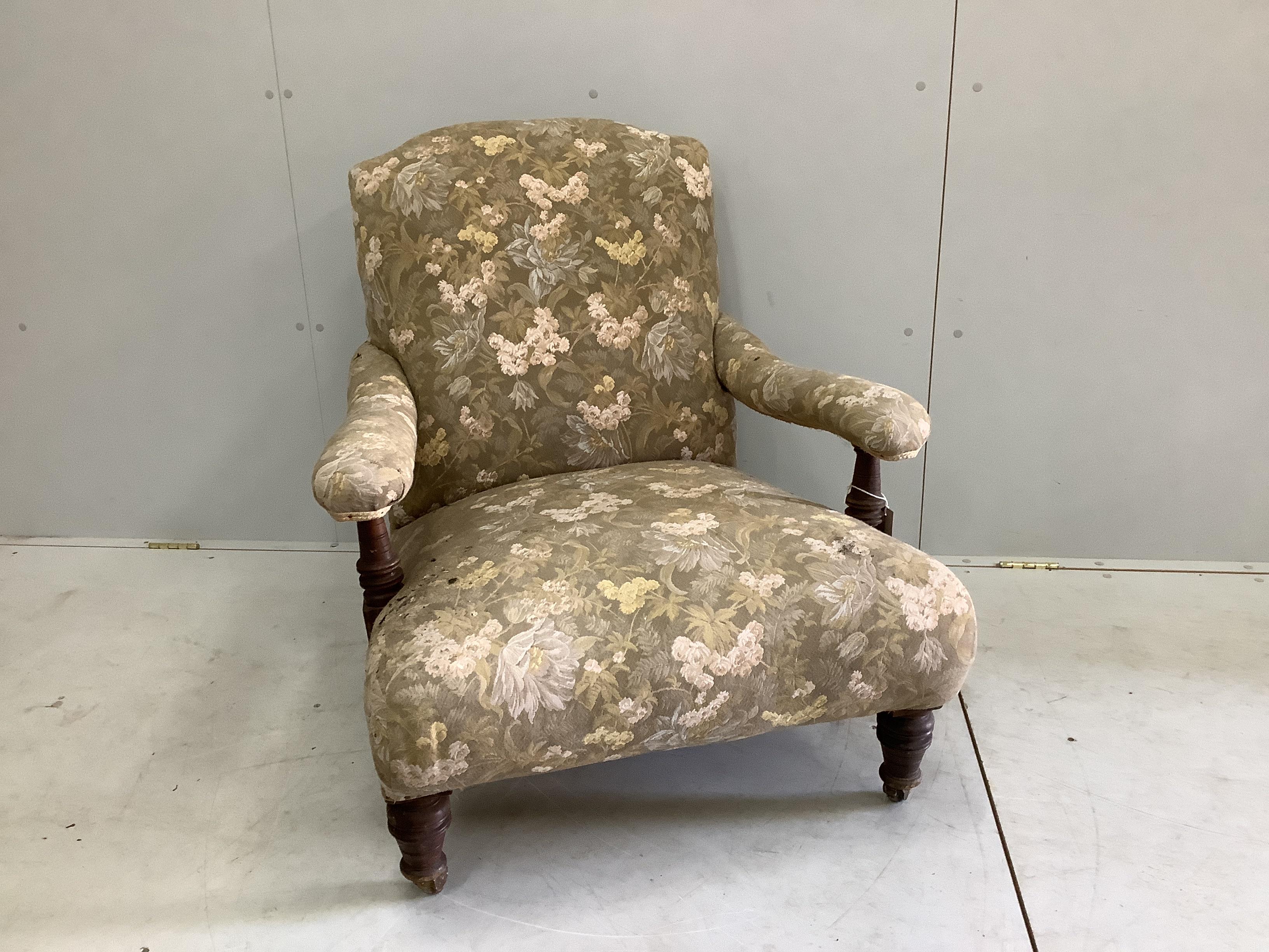 A Victorian Howard style open armchair, width 77cm, depth 84cm, height 84cm